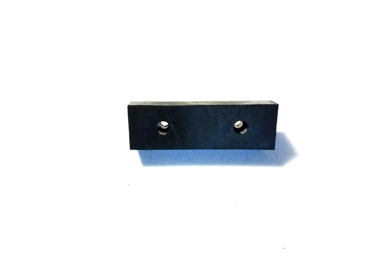 Long rectangular heavy-duty rubber bumper pad with recessed metal washers for screw mounting