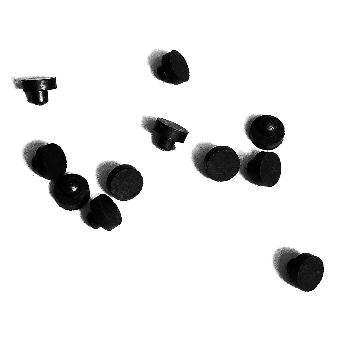 Group of 9/16" black SBR rubber stem bumpers showing flat round heads and short straight stems